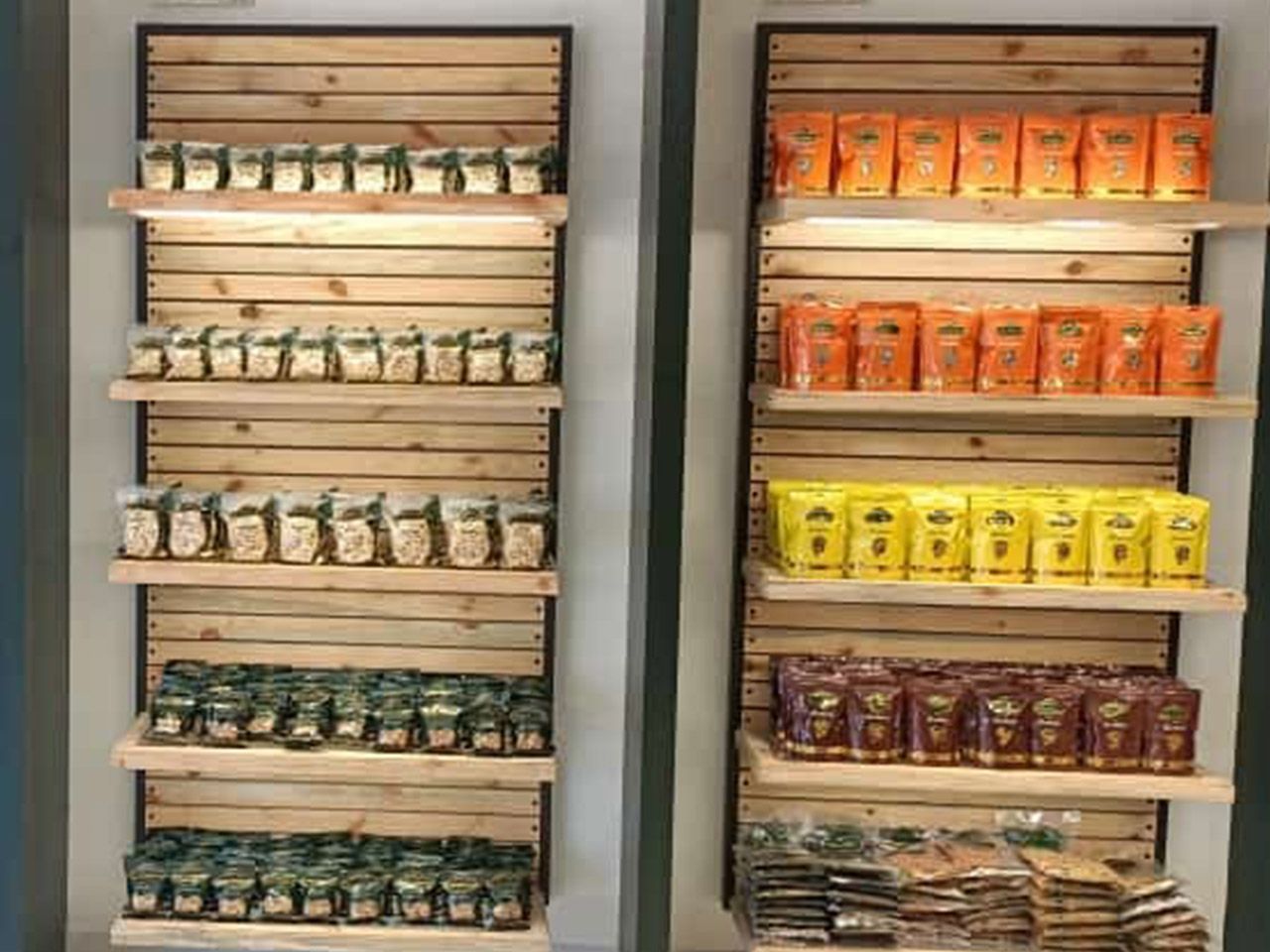 Shelves of colour-coded nut pouches